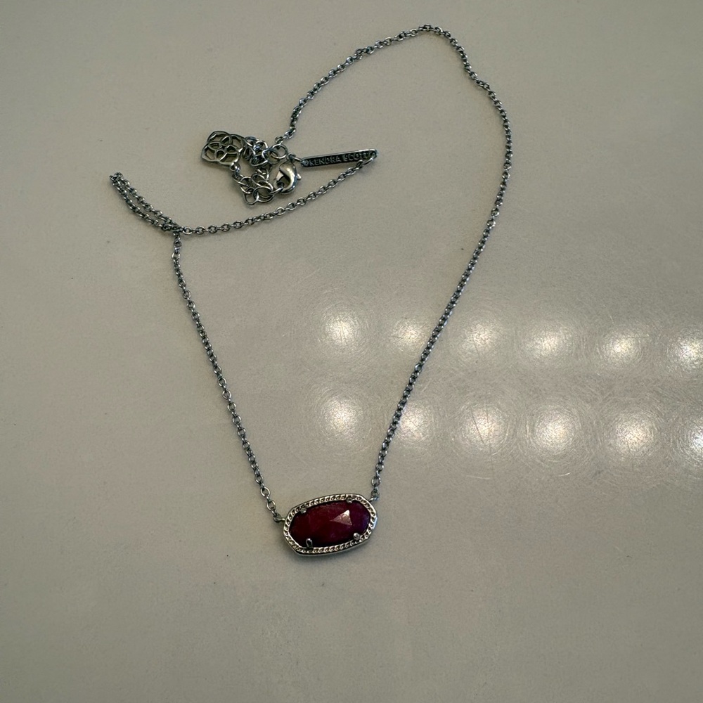 Kendra Scott necklace.